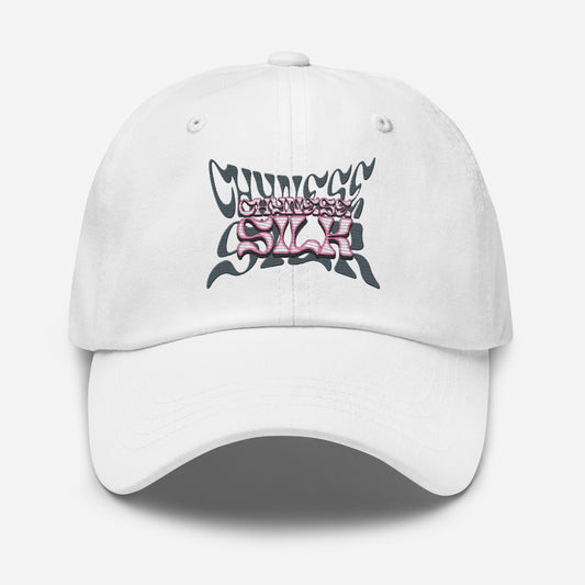 White premium streetwear dad hat featuring the embroidered Chynese Silk Namesake logo design.